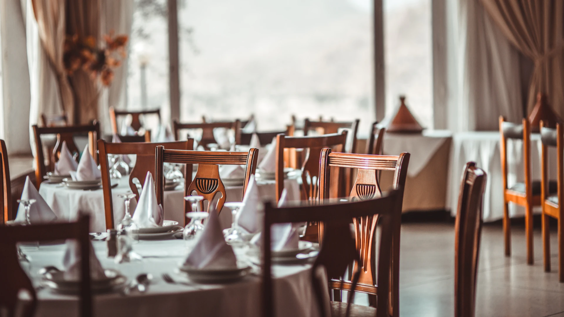 The main dining room of Casa Sabater with the tables laid